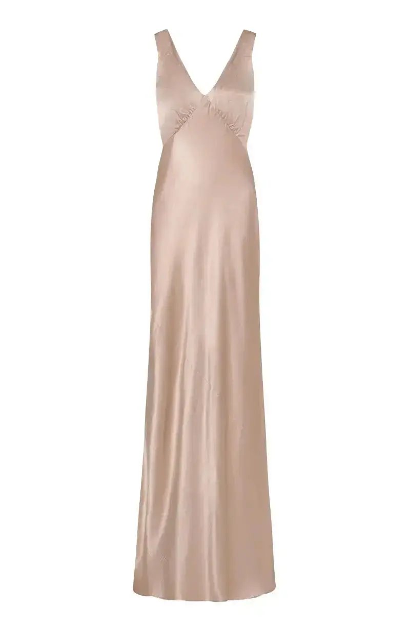 champagne satin bridesmaid evening gown on a white background