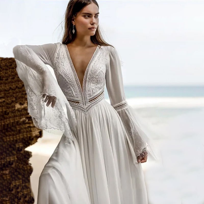 close-up view of bride on beach wearing a white Long Backless Wedding Gown with Deep V-Neck and Flare Sleeves
