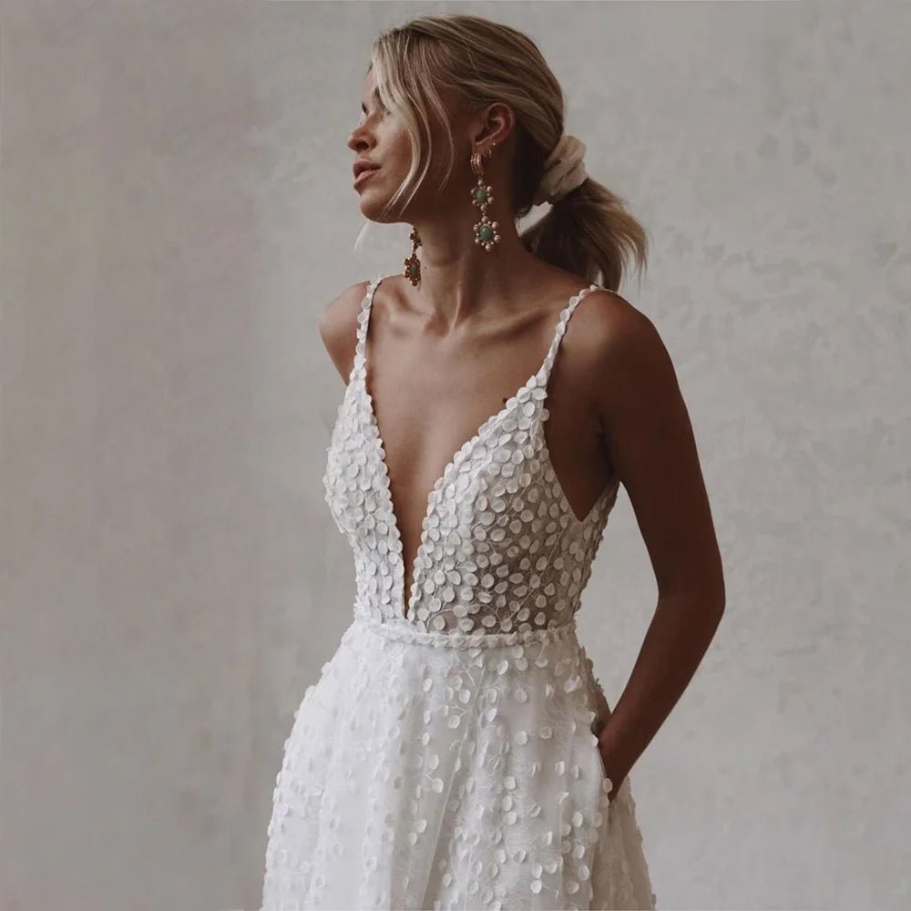 Close-up view of a bride wearing a Deep V-Neck Wedding Dress with Pockets and Spaghetti Straps
