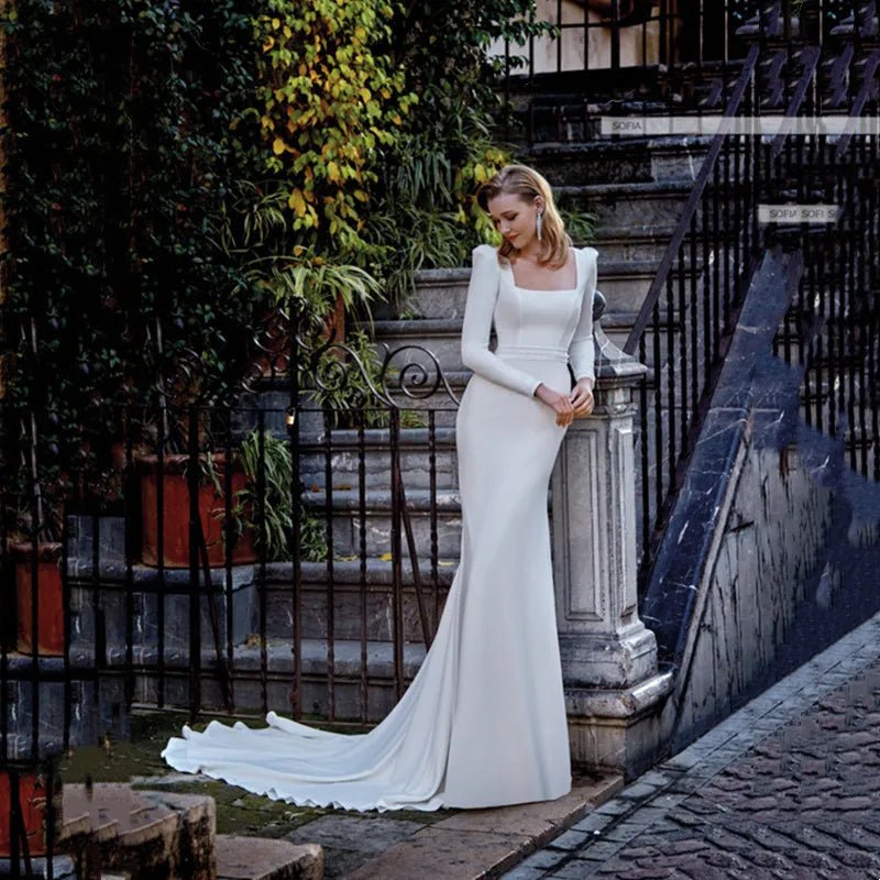 front view of a bride wearing a Classic Long Sleeve Backless Mermaid Wedding Dress with Square Collar