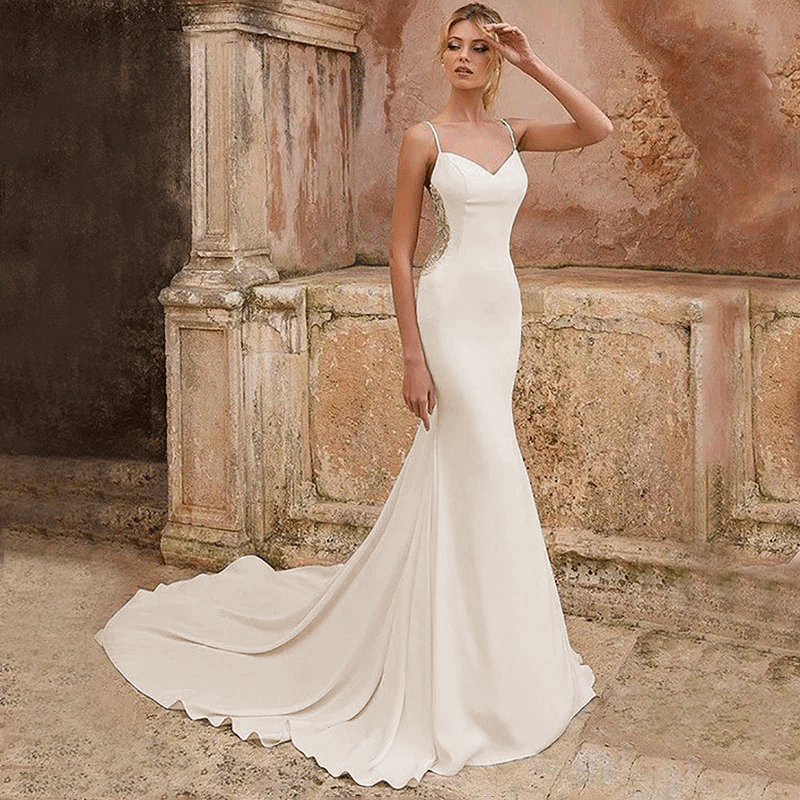front view of bride wearing an ivory Simple Mermaid Wedding Dress with V-Neck and Spaghetti-Straps