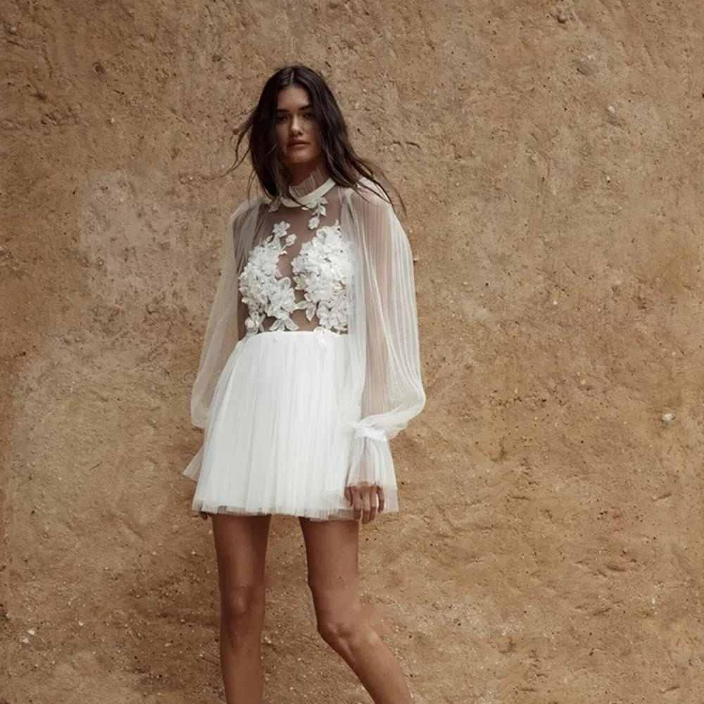 front view of a bride wearing a white Short Backless Illusion Wedding Dress with Long Puff Sleeves