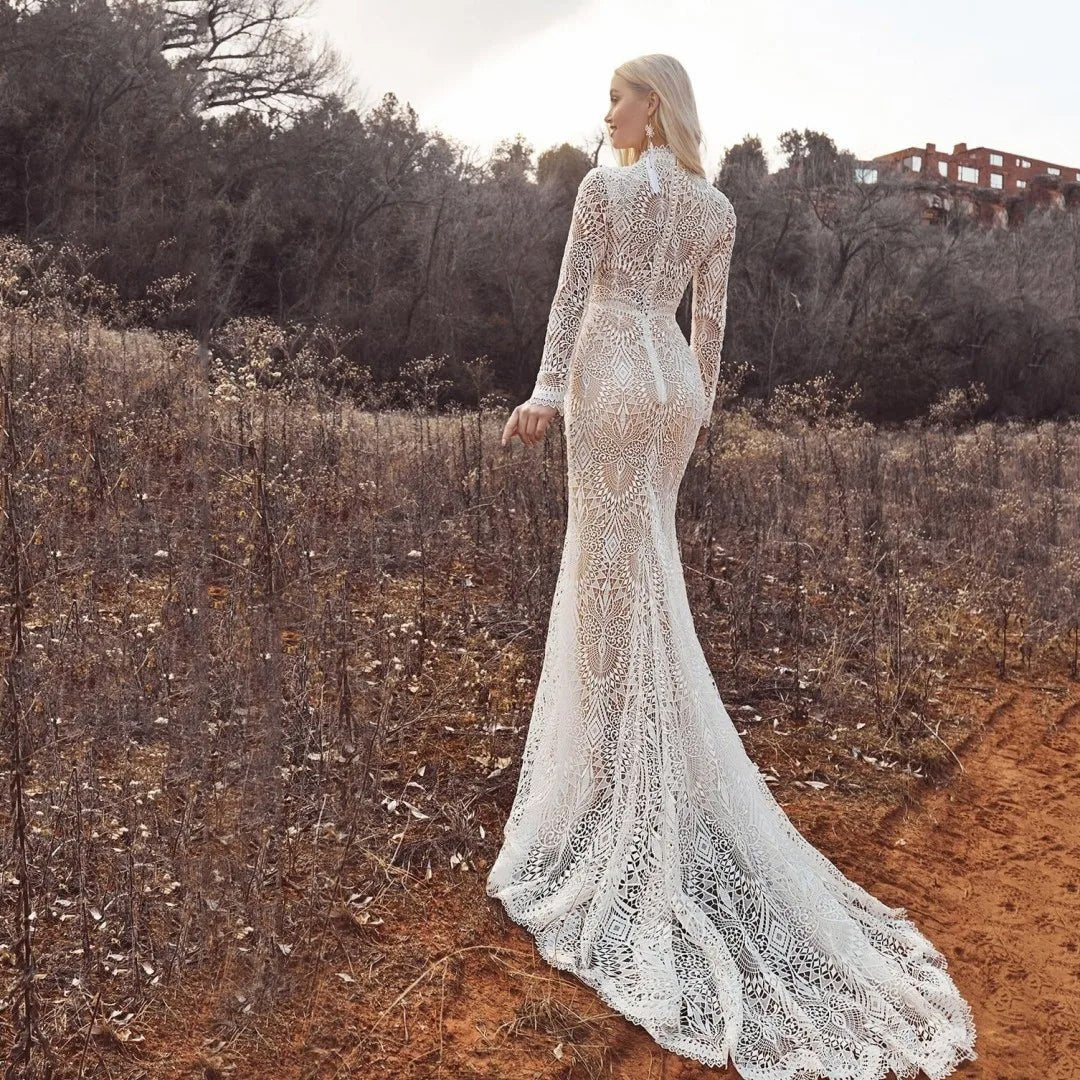 rear view of bride wearing a white High Collar Long Sleeved Vintage Wedding Dress with Embroidered Lace