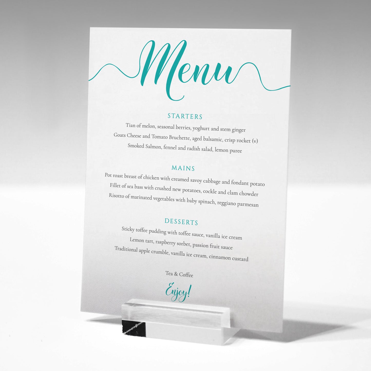 3 course turquoise menu card in a glass menu stand