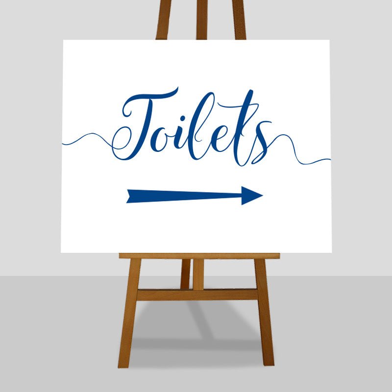 azure blue wedding toilets arrow sign on an easel