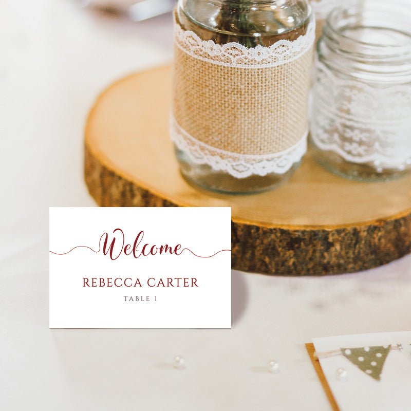 deep red place card on a wedding table