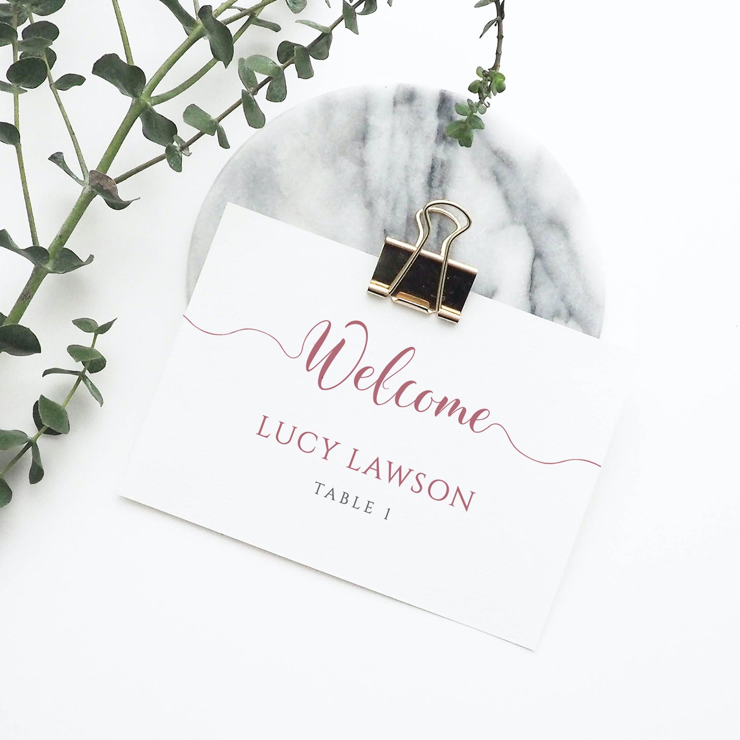 dusty pink place card in metal clip
