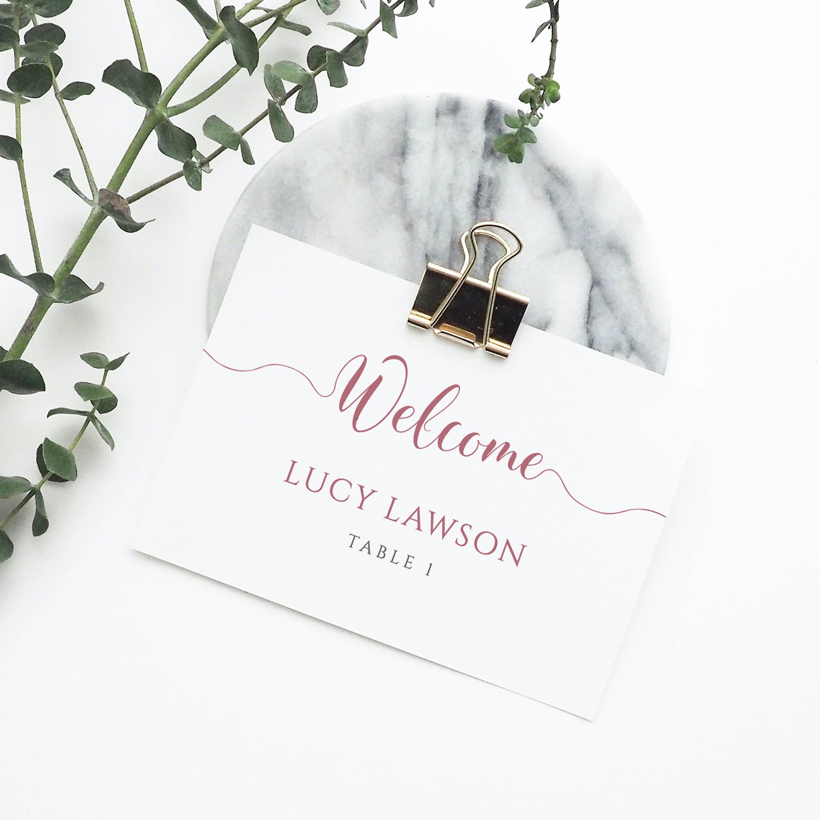dusty pink place card in metal clip