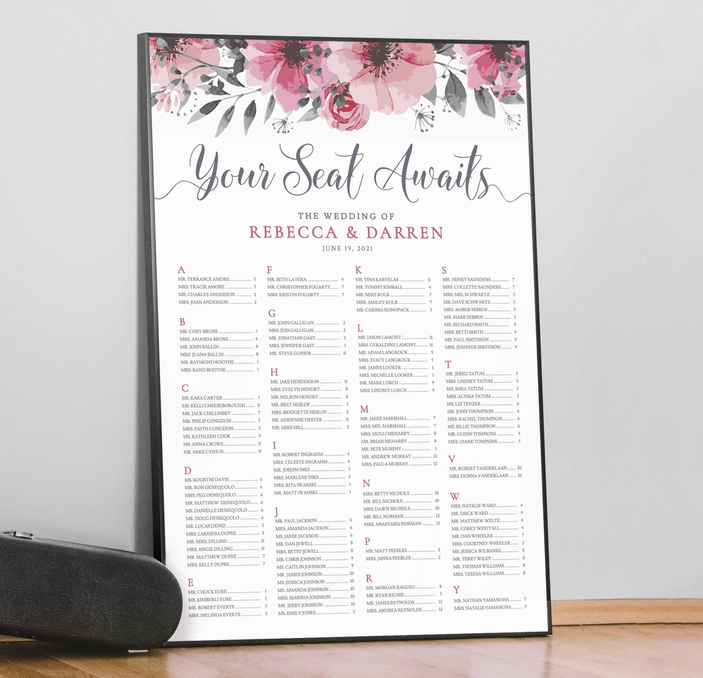 A1 alphabetical seating plan with floral border in a black frame