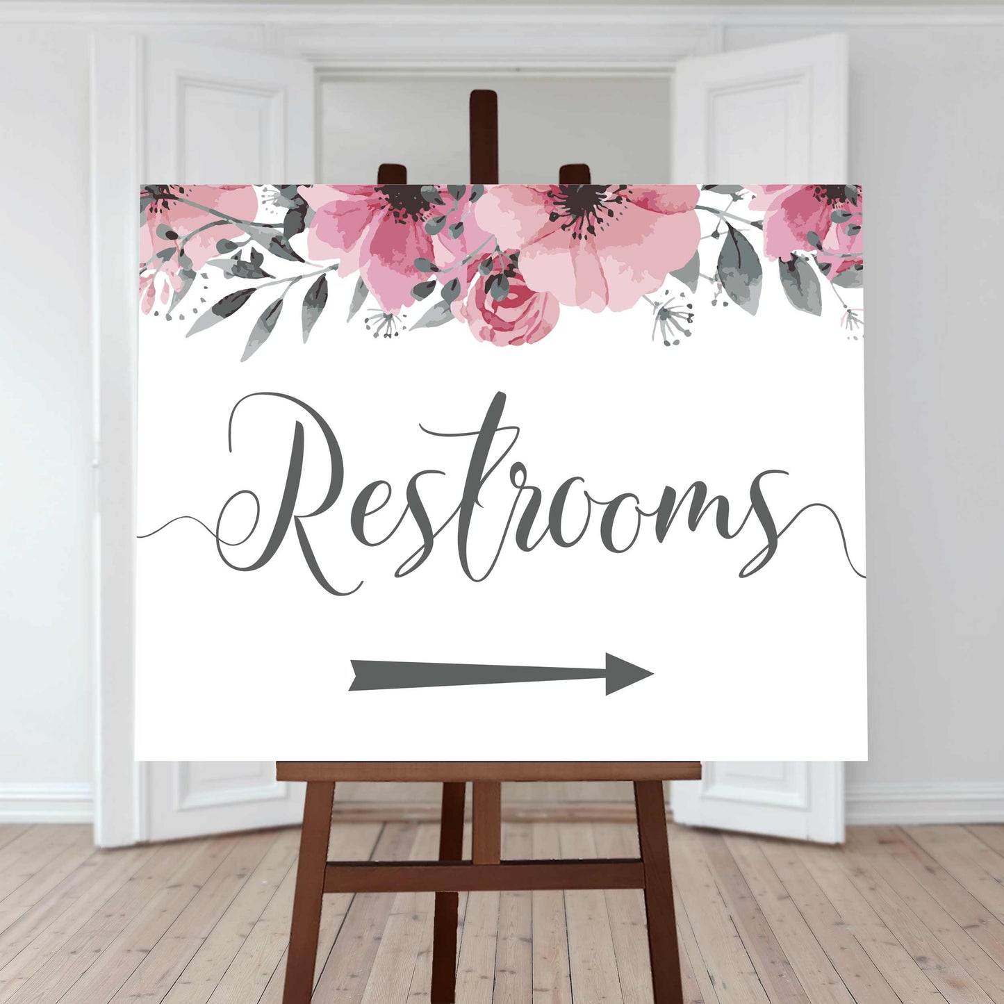 restrooms directions sign right arrow and floral border