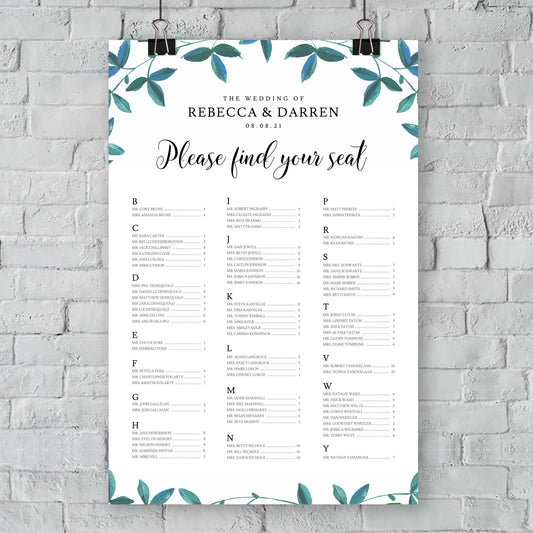 green foliage alphabetical find your seat sign hanging from a wall