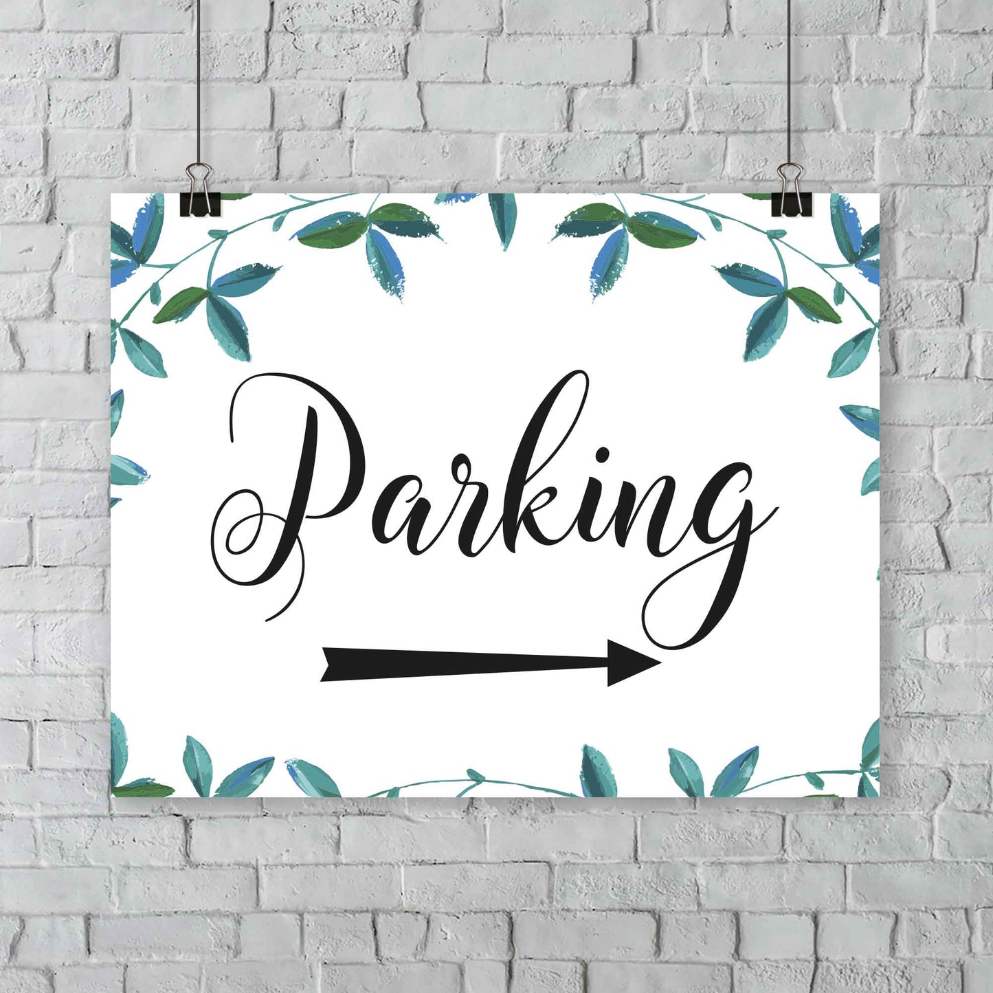 green foliage car port right arrow sign hanging from a white wall