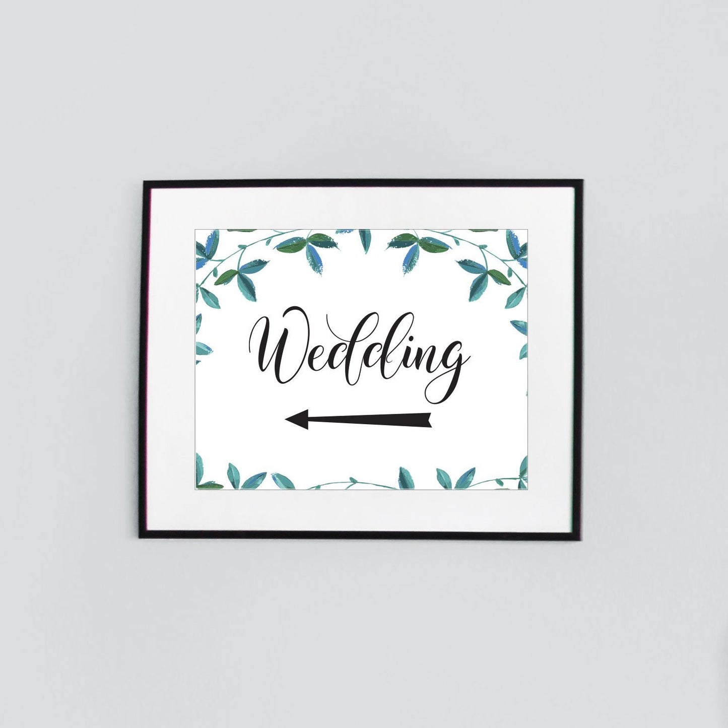 Printable A3 wedding arrow sign with green leaves border in a picture frame
