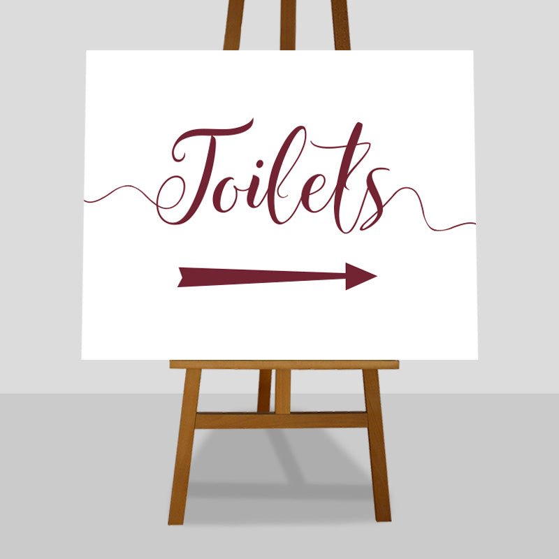 maroon wedding toilets arrow sign on an easel