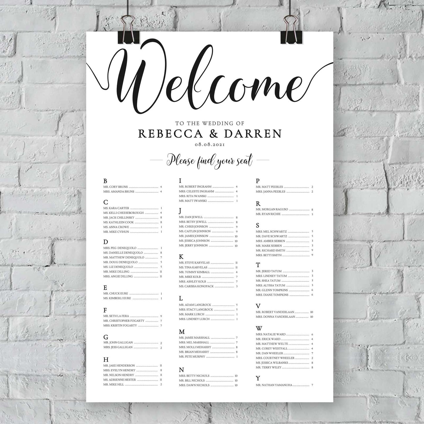 minimalist alphabetical seating chart hanging from a wall