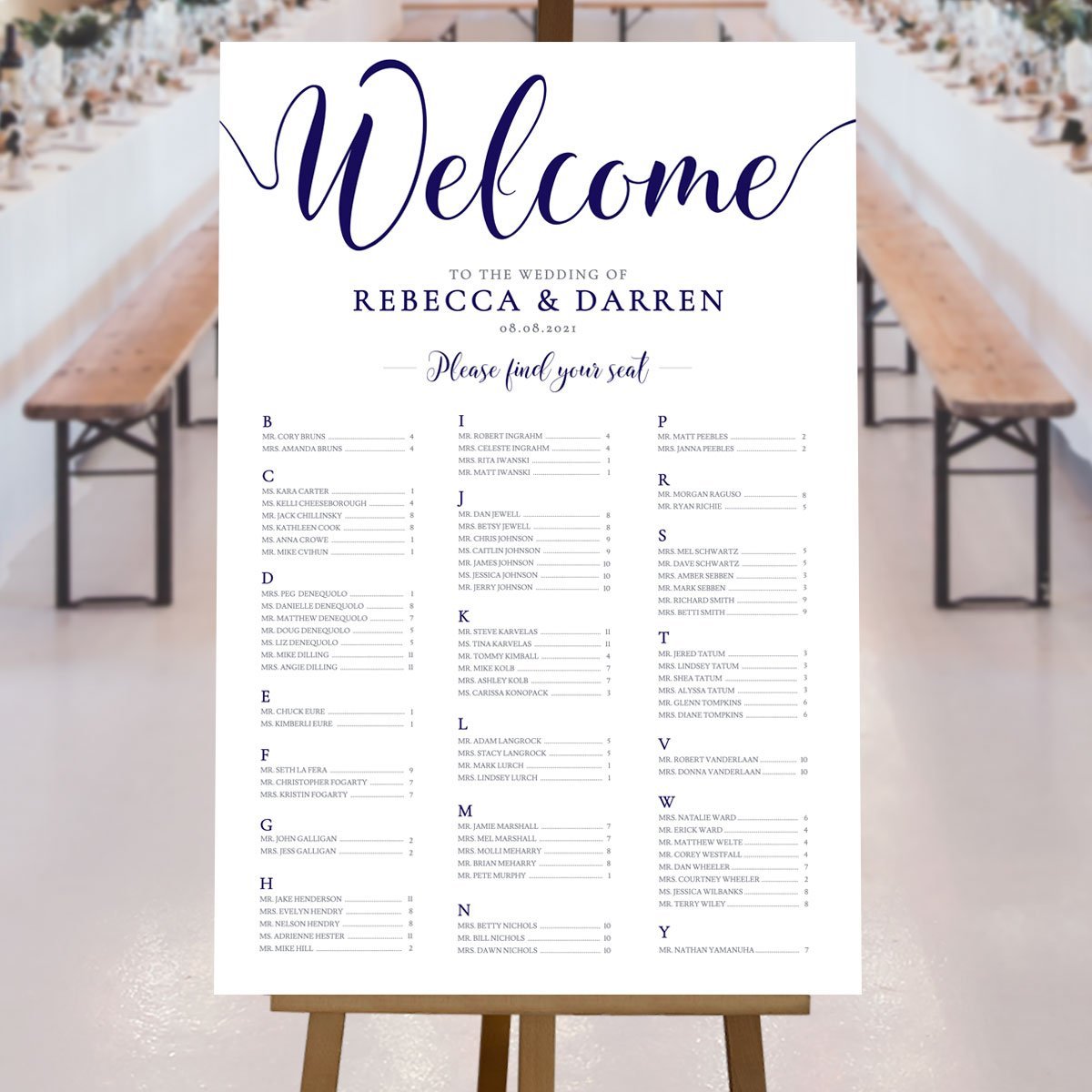 navy a-z table plan at a rustic wedding