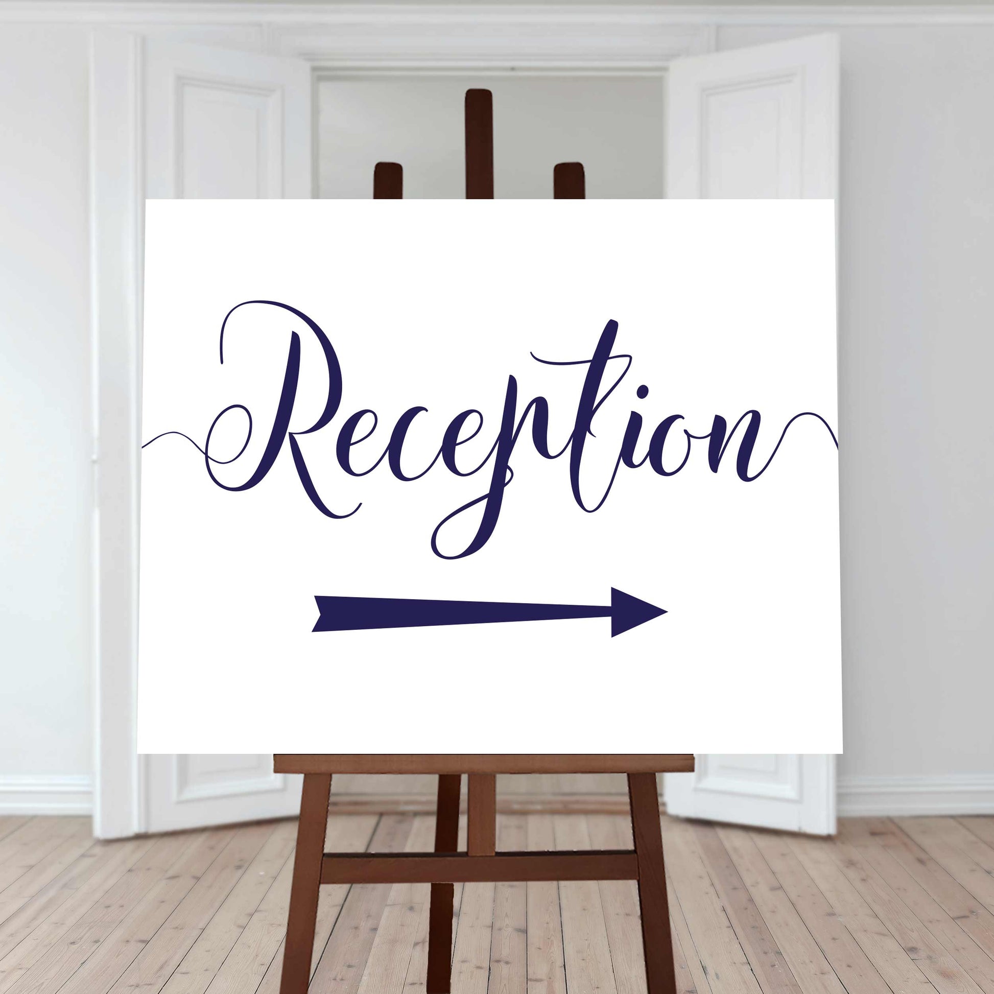 navy wedding reception arrow sign