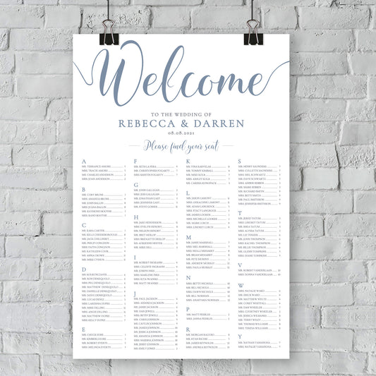 outdoor wedding seating plan hanging on wall