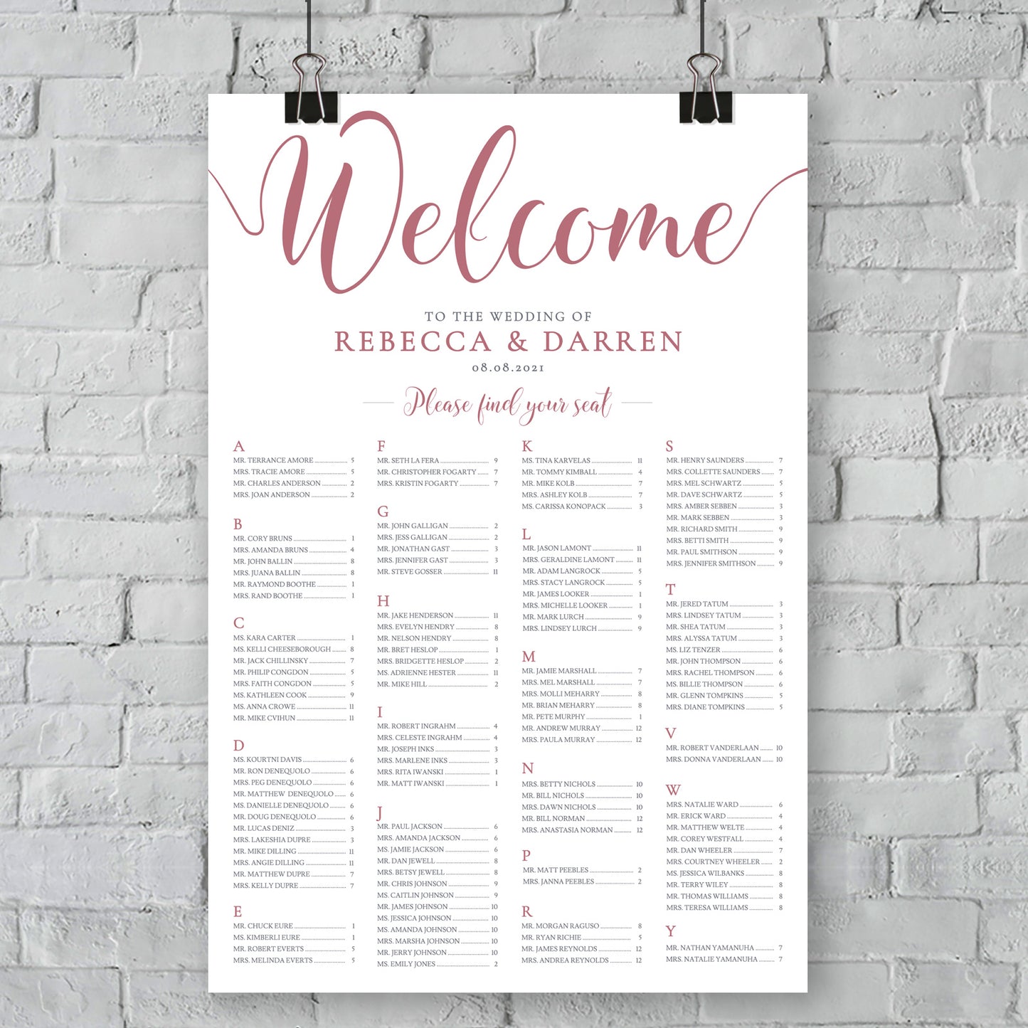 outside wedding seating chart on wall