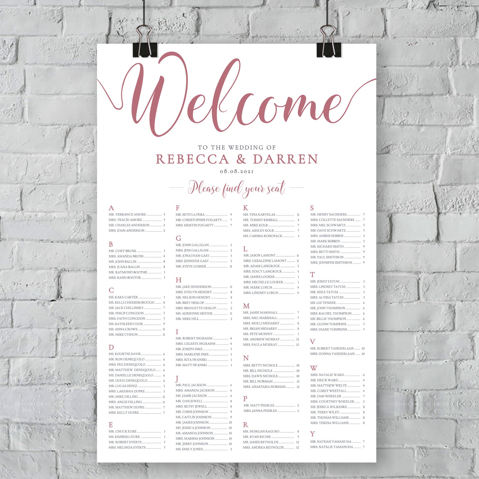 outside wedding seating chart on wall