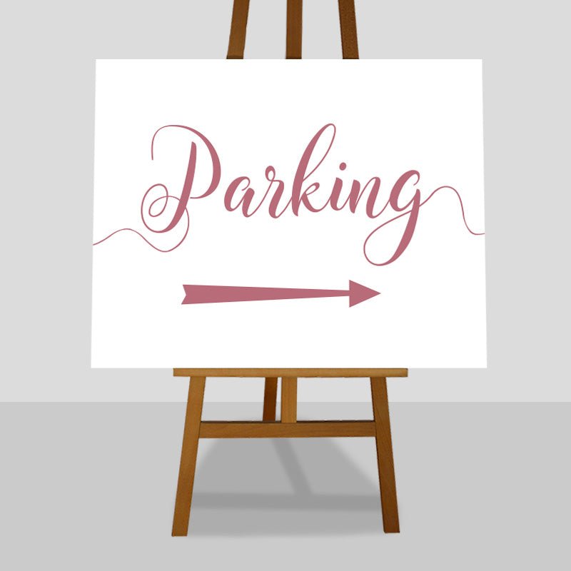 pastel pink wedding parking arrow sign on an easel