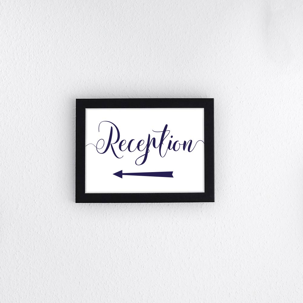 navy wedding reception sign with a left arrow