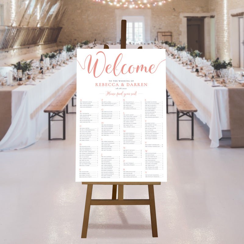 rose gold seating chart at a rustic barn wedding