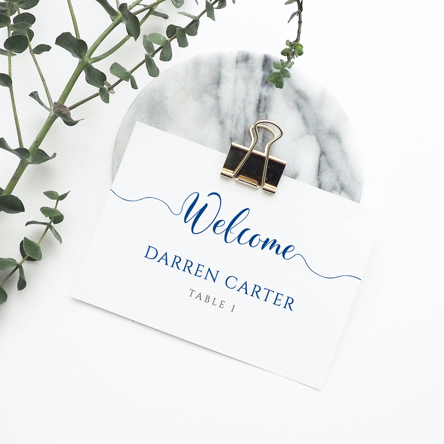 royal blue wedding place card in metal clip