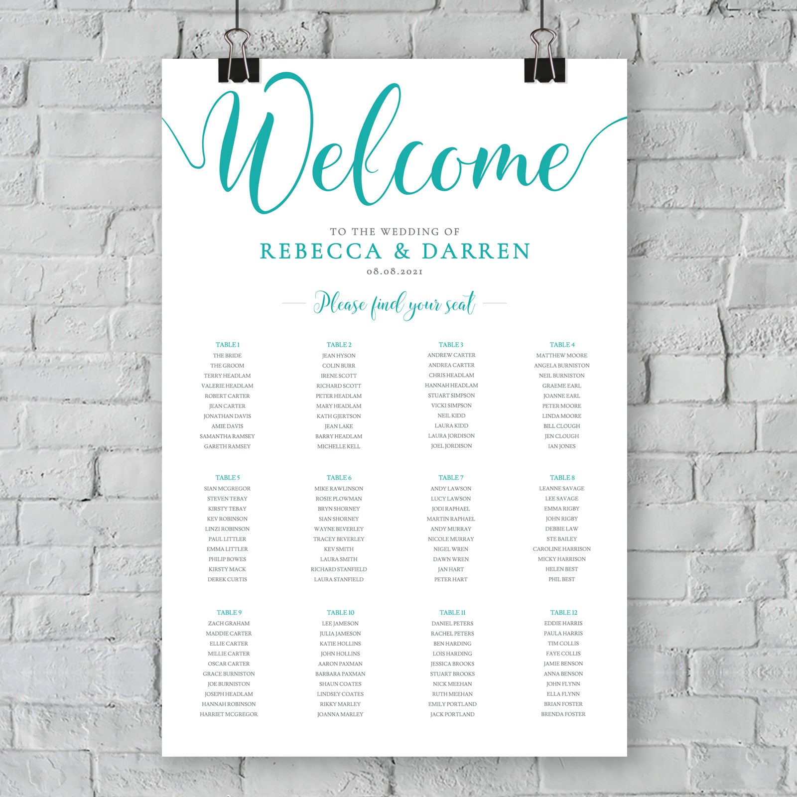 turquoise wedding seating chart against outside wall