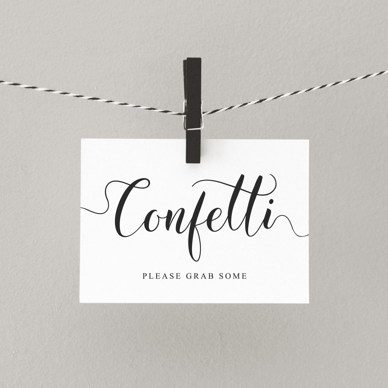 DIY confetti sign hanging from a peg