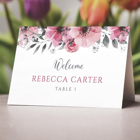 boho wedding table with floral folded name card with