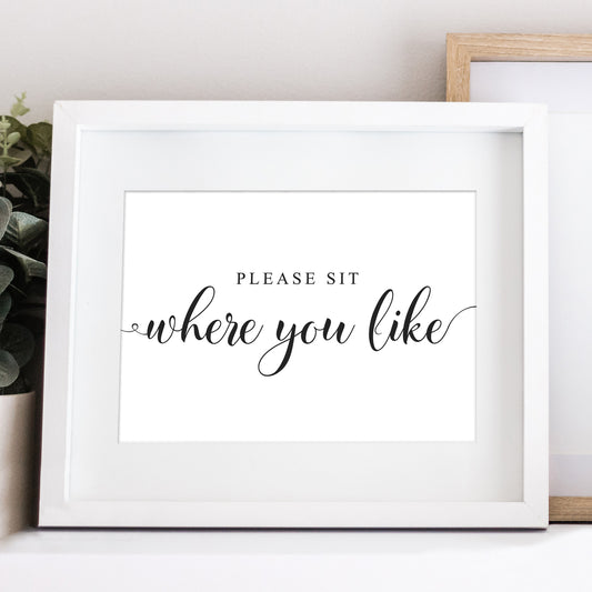 Informal wedding sign which reads please sit where you like