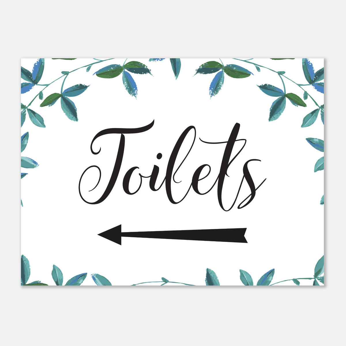 A rectangular white sign with the word "Toilets" in black script and a black left-pointing arrow below it. The sign is framed by a watercolor-style border of green and blue leaves on a light gray background.