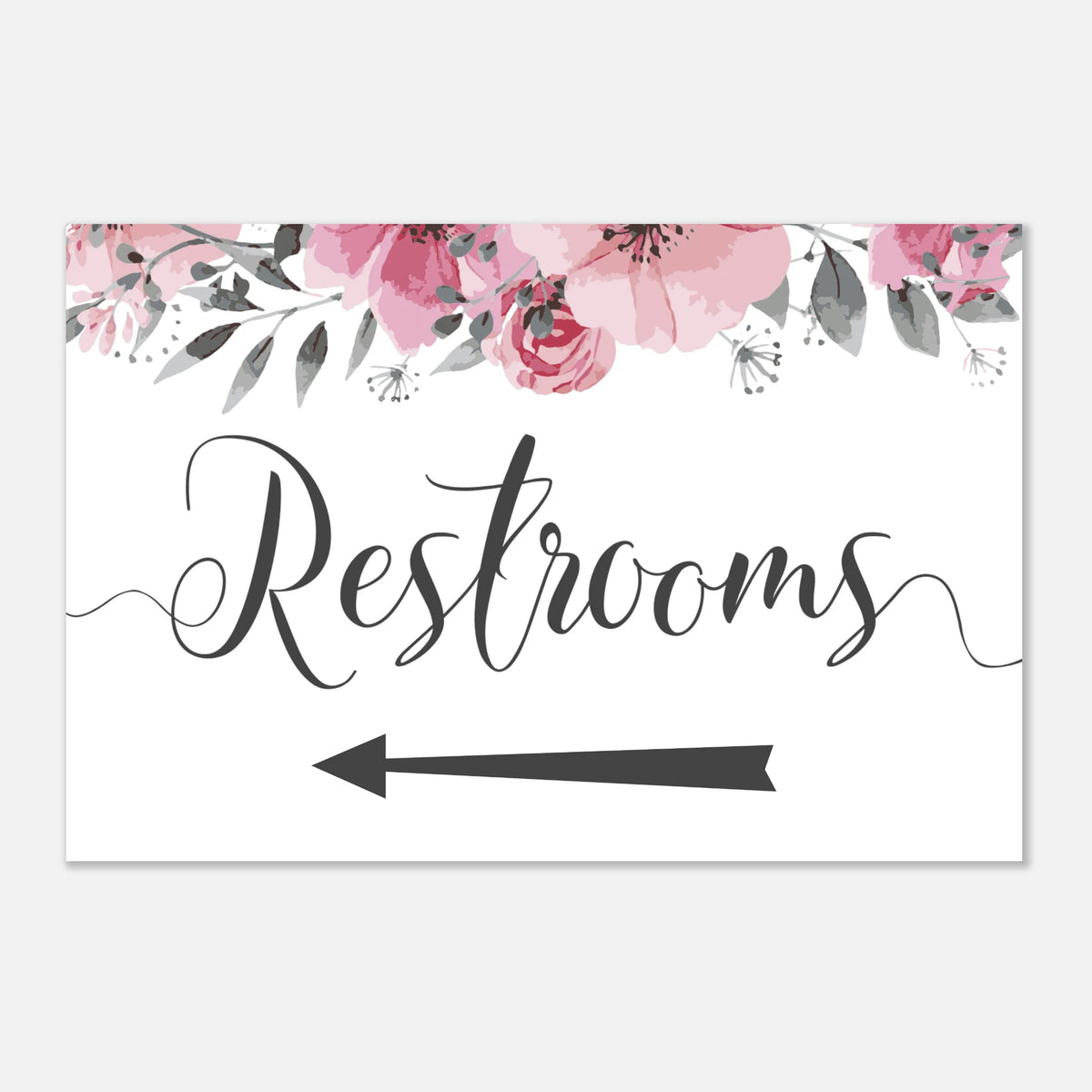 A rectangular restroom sign with a white background, pink watercolor flowers along the top, and the word 'Restrooms' in large black script above a black arrow pointing left, shown on a light gray background.