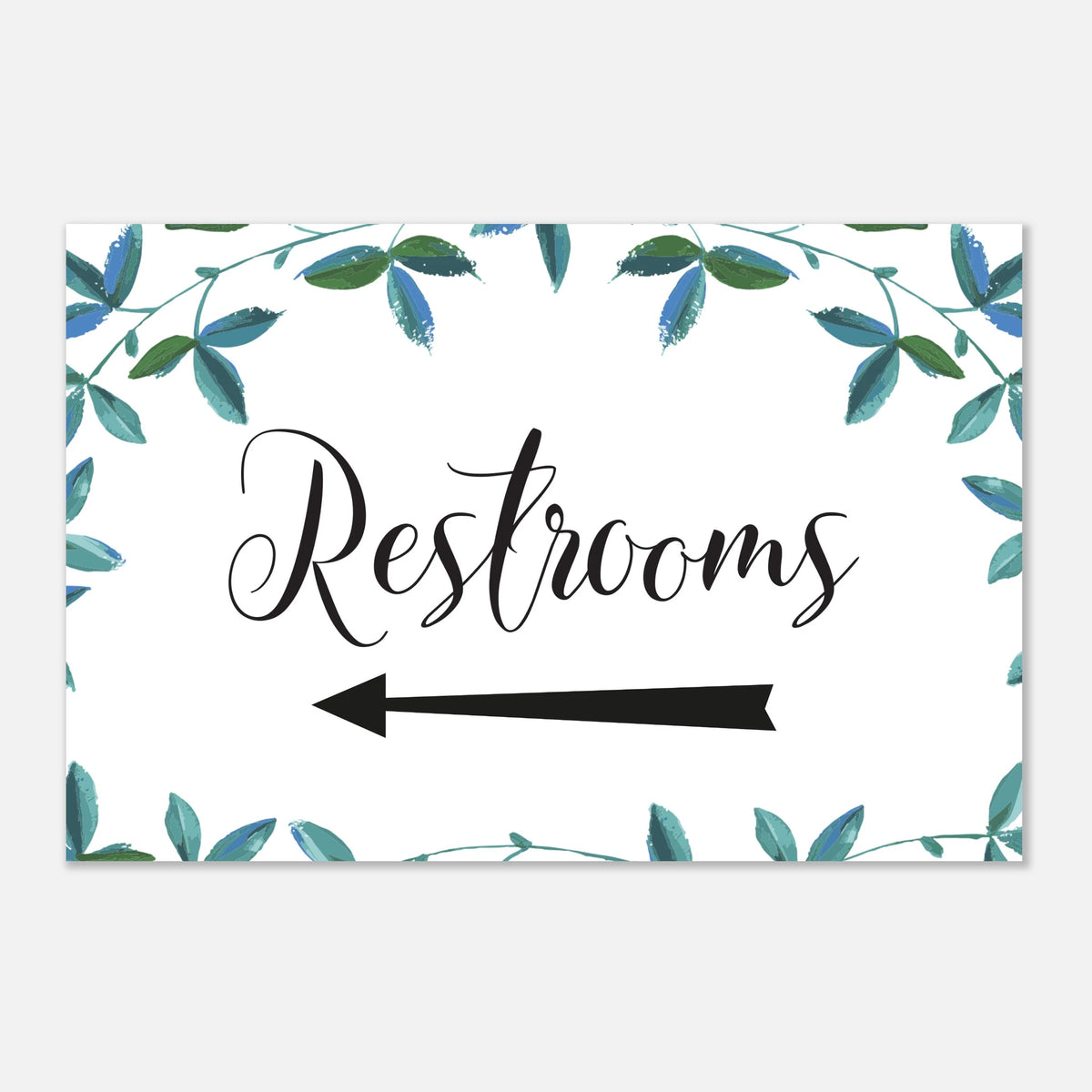 A rectangular restroom sign with a white background, black script text reading 'Restrooms,' a black left-pointing arrow, and a watercolor-style border of blue and green leaves around the edges.