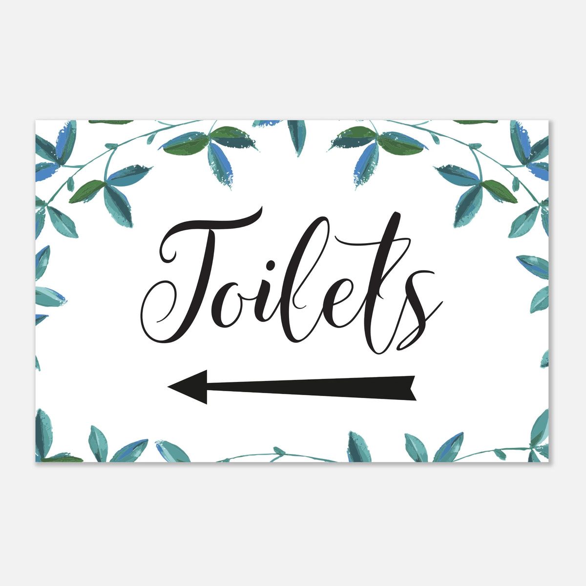 A rectangular white sign with a watercolor leaf border in blue and green, featuring the word 'Toilets' in black script and a black left-pointing arrow below.