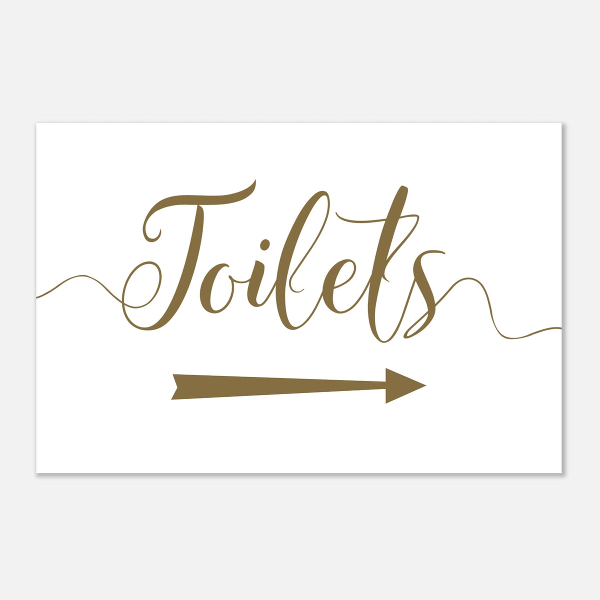 A rectangular white sign with the word 'Toilets' in brown cursive script and a brown arrow pointing right, shown on a light gray background.