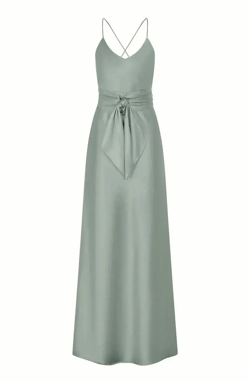 Sage green bridesmaid dress with thin straps on a white background