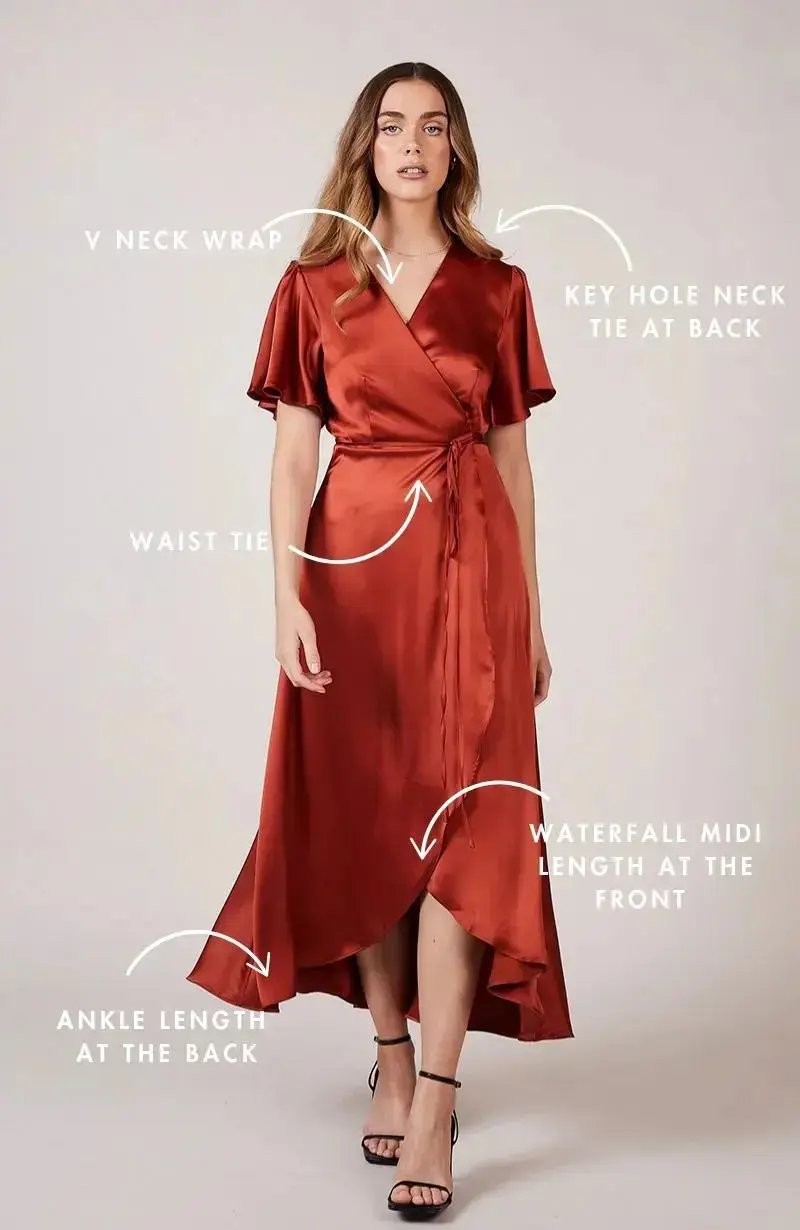Burnt orange satin bridesmaid dress with design annotations on a light gray background