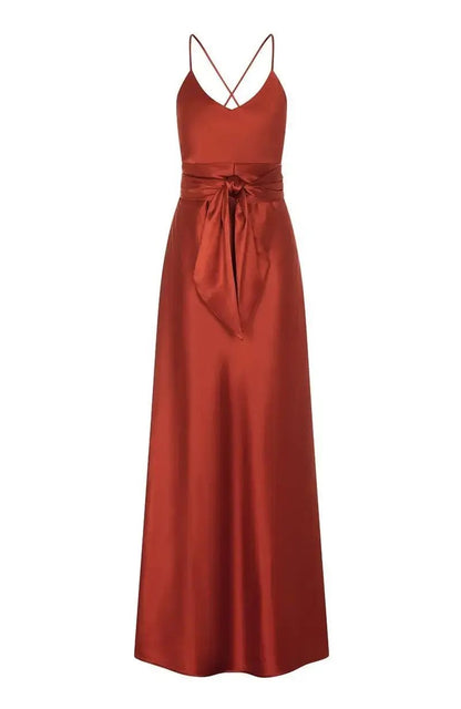 burnt orange evening bridesmaid gown with a belt on a white background