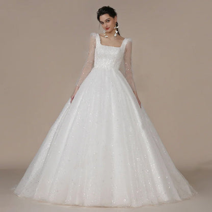 Long-Sleeved Modern Ivory Wedding Dress front view