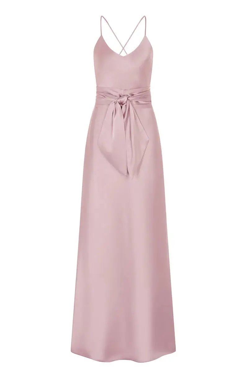 Pink evening gown with thin straps on a white background