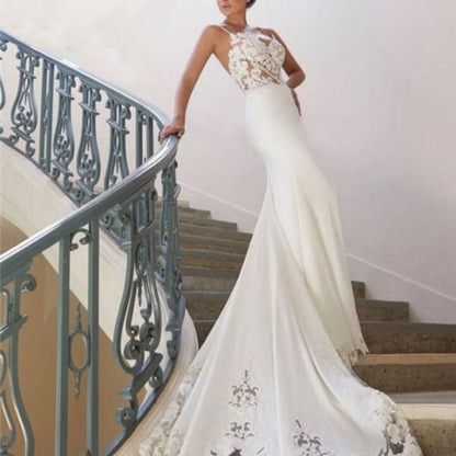 Bride with Modern Satin and Lace Mermaid Wedding Dress on stairs