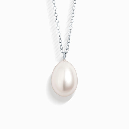 A single pearl pendant necklace with a white tear-drop shaped pearl on a silver chain.
