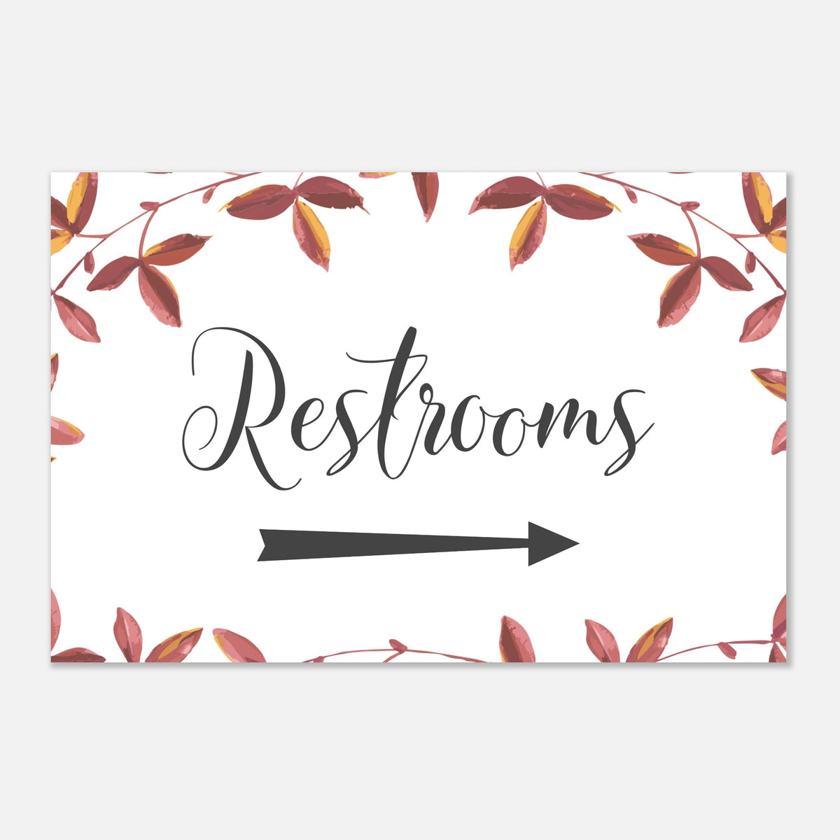A rectangular restroom sign with a white background, a watercolor-style border of autumn leaves in red, brown, and yellow, the word 'Restrooms' in black script, and a black arrow pointing right.
