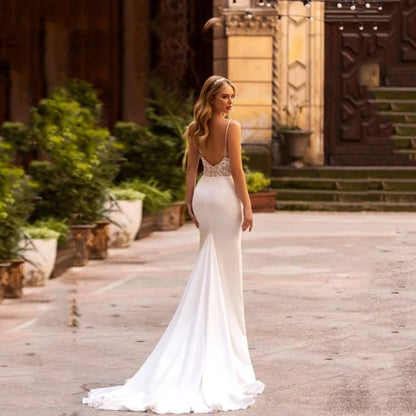 back view of bride in Modern Satin Lace Embroidered Sleeveless Wedding Dress