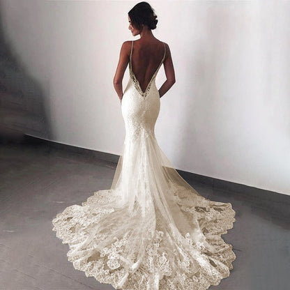 back view of bride wearing an Ivory Elegant Vintage Backless Lace Mermaid Wedding Dress