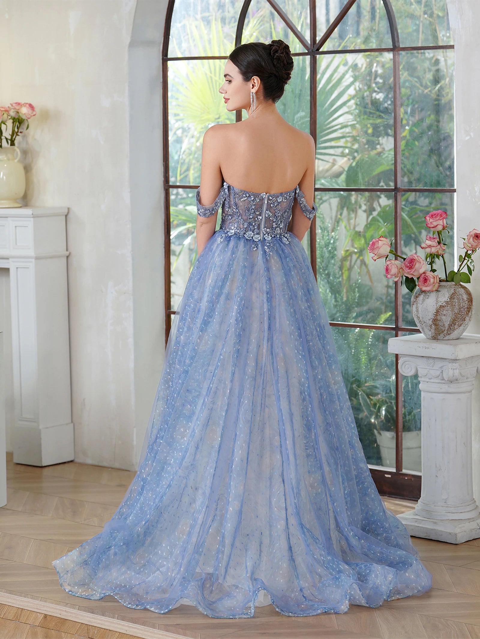 back view of prom girl wearing blue sparkling off-the-shoulder a-line dress