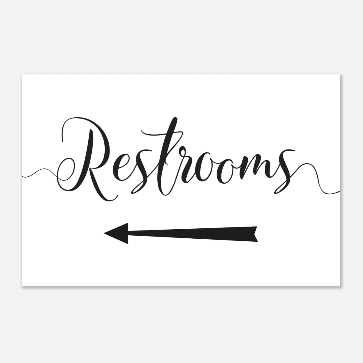 A rectangular white sign with the word 'Restrooms' in black script and a black left-pointing arrow below, shown on a light gray background.