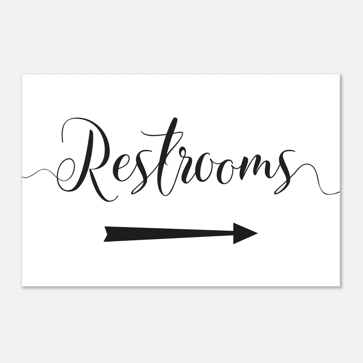 A rectangular white sign with black script reading 'Restrooms' and a black arrow pointing right, shown on a light gray background.